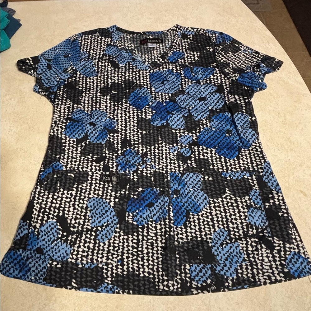 KOI Women's Blue and Black Floral Scrub Top